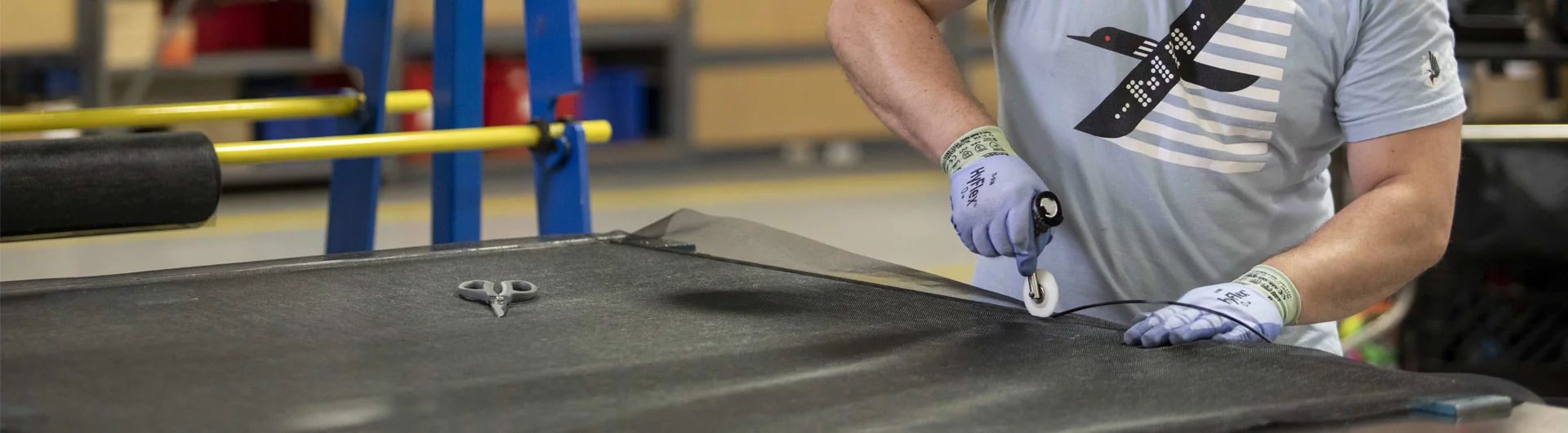 Man assembling a door screen